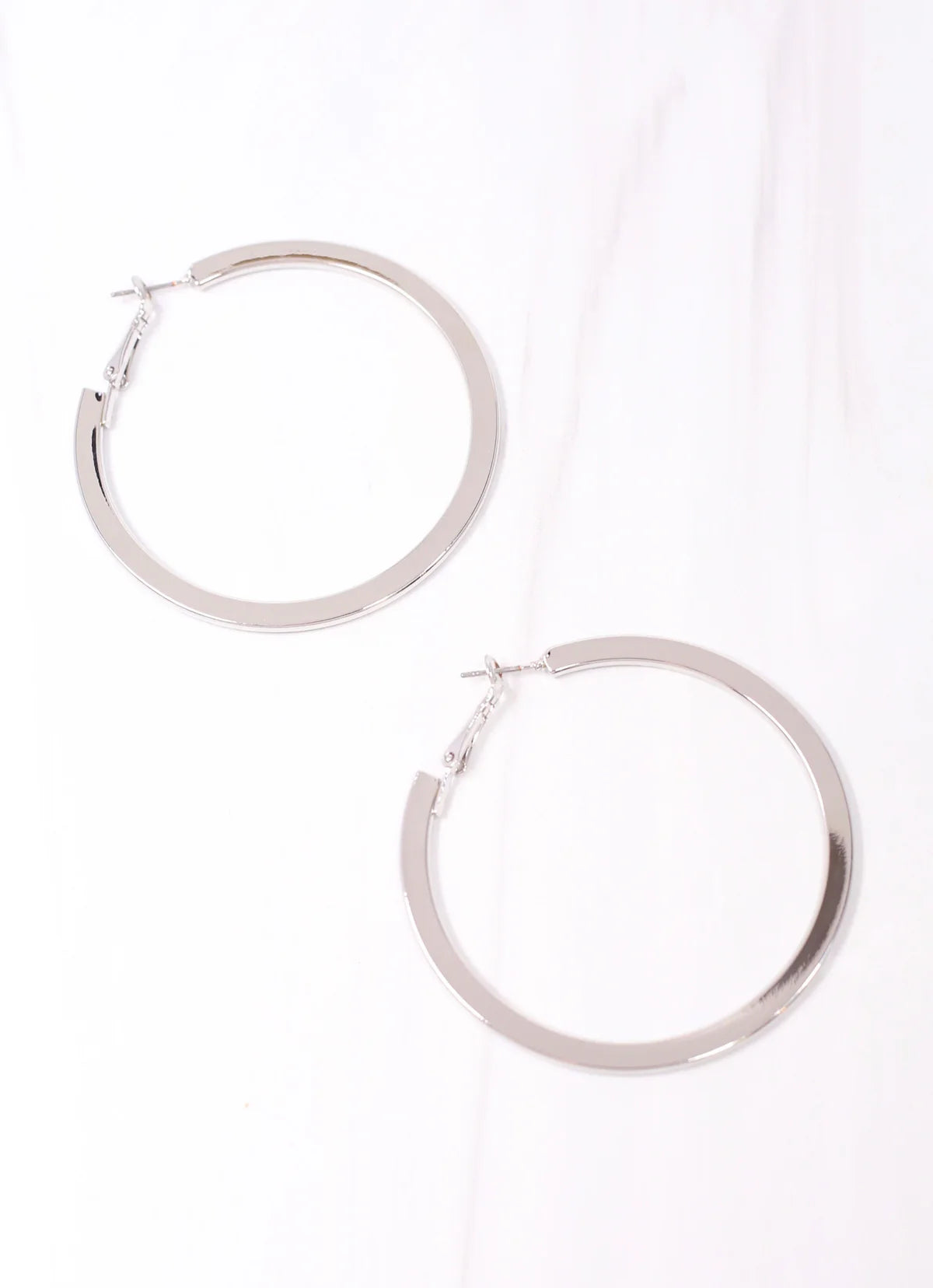Caroline Hill Shiny Silver Suffield Flat Hoop Earrings