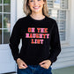 Womens On The Naughty List On Black Crop Sweatshirt